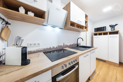 ** Elegant 1 room business apartment with a wonderful balcony**