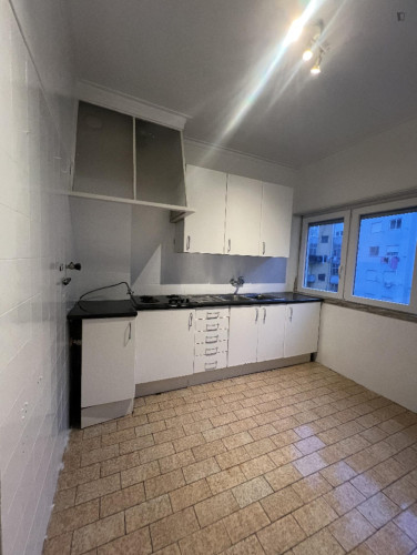 Introducing Single Bedroom with a balcony close to Lisbon Theater and Film School