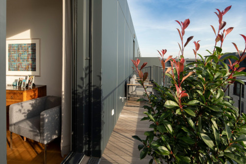 Exclusive penthouse with fireplace and view over the roofs of Berlin.