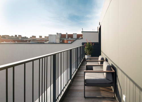 Exclusive penthouse with fireplace and view over the roofs of Berlin.