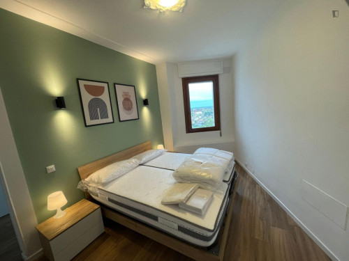 Spacious Double Bedroom with access to balcony well connected to Università degli Studi eCampus Treviso