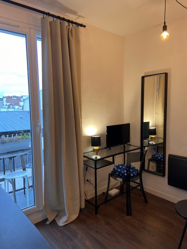 Bright Top-Floor Furnished Studio with Balcony & Panoramic View – Paris 11th