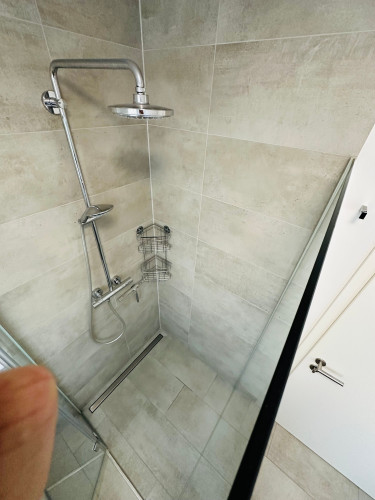 New luxury apartment in a prime downtown location, with balcony and parking space