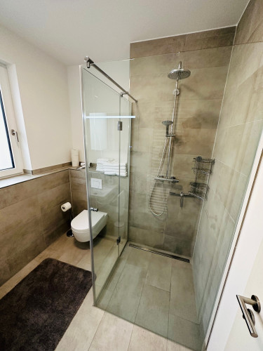 New luxury apartment in a prime downtown location, with balcony and parking space