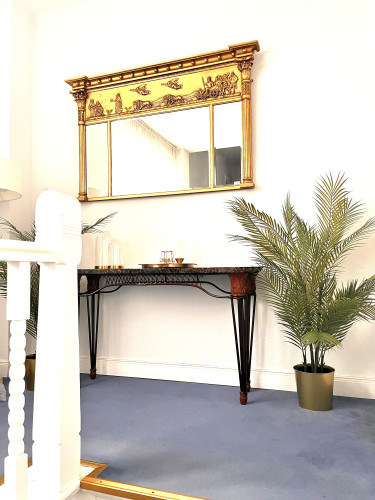 Elegant 4½-room apartment with lake view, two bathrooms, and private garden area in a historic villa