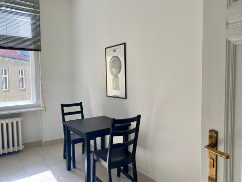 BRIGHT APARTMENT IN AN OLD BUILDING ON THE LIETZENSEE with high ceilings and a balcony