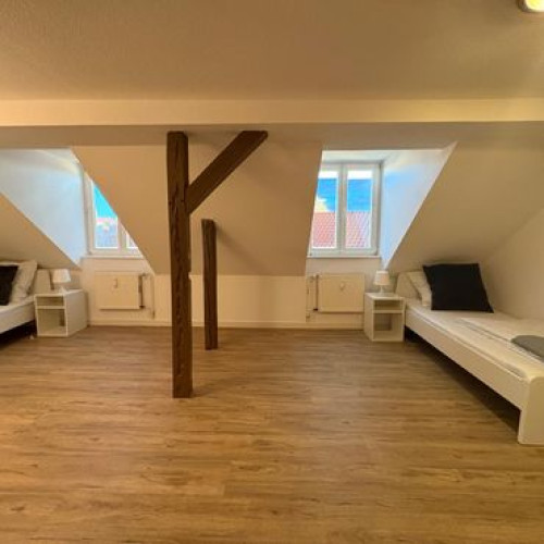 Compact Private Bed — Shared Comfort