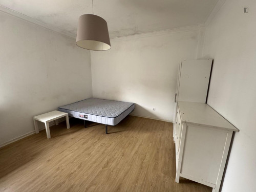 Sunny bedroom in Santo António dos Olivais area