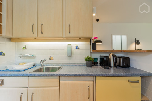 Lovely and bright Studio with large balcony in quiet location