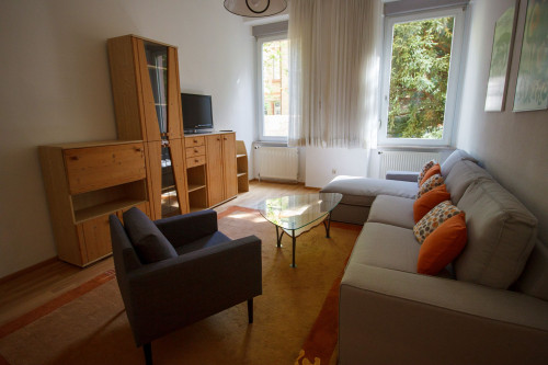 Quiet and charming apartment in central city location with southside view