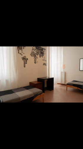 Bed in a twin bedroom, part of a 2-bedroom flat in Gratosoglio  - Gallery -  5