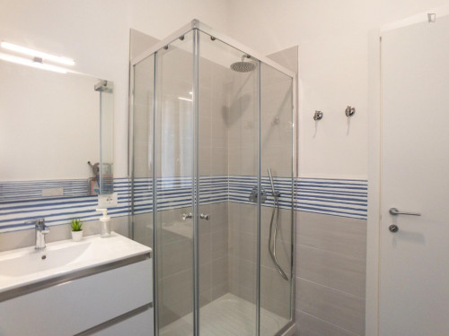 Bed in a twin bedroom in a 5-bedroom flat