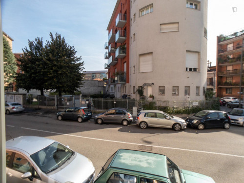 Bed in a twin bedroom in a 5-bedroom flat