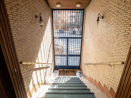 Bed in a twin bedroom in a 5-bedroom flat