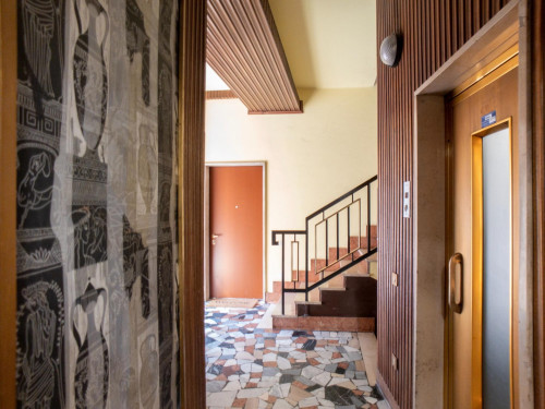 Bed in a twin bedroom in a 5-bedroom flat