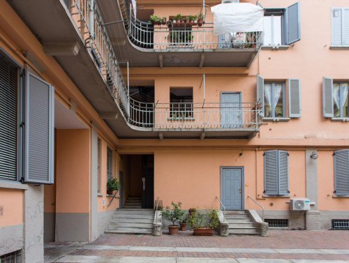 Bed in cool twin bedroom in in Zona Delle Regioni