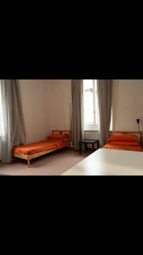 Bed in a twin bedroom, in a 2-bedroom flat near Famagosta metro