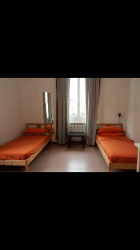 Bed in a twin bedroom, in a 2-bedroom flat near Famagosta metro