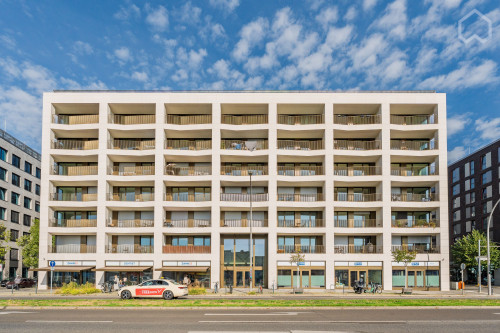 Premium two-room Apartment with beautiful views of the River Spree, historical Berlin Wall and the Oberbaum Bridge in top location