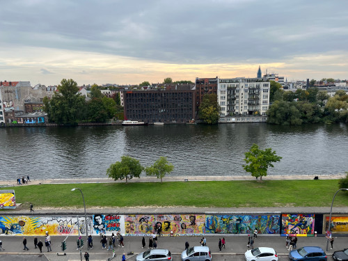 Premium modern two-room Apartment in top location with beautiful views of the River Spree, the historic Berlin Wall and the Oberbaum Bridge