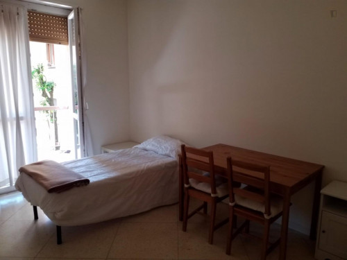 Bed in a twin bedroom close to NABA