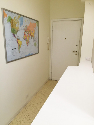 Bed in a twin bedroom close to NABA