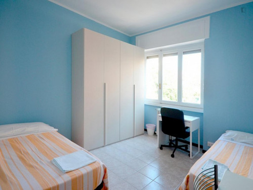 Bed in a twin bedroom close to Romolo metro station