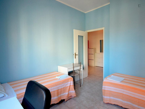 Bed in a twin bedroom close to Romolo metro station