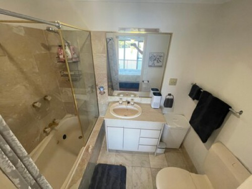 Master bedroom with ensuite & AC