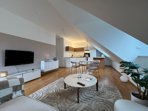 A fully furnished, exclusive penthouse combining serene living with excellent accessibility.