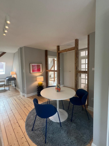 Charming Attic Apartment in Modernized Period Building – Gütersloh Center