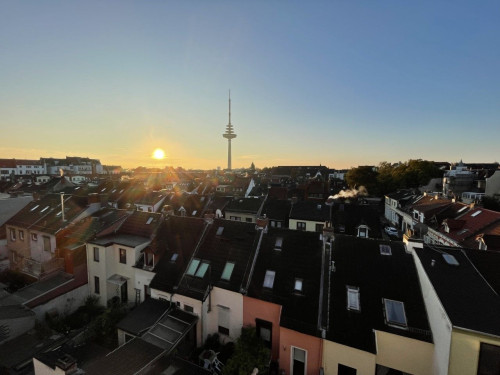 Light-flooded attic studio with a panoramic view over Bremen - Gallery - 5