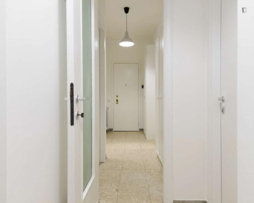 Bright double bedroom in the Gallaratese district