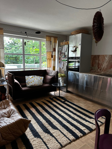 Designer apartment with large terrace near Isar, forest, and S-Bahn