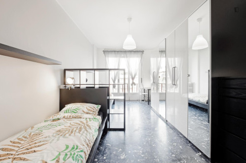 Bed in a comfortable twin bedroom, in the Municipio 6