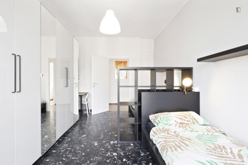 Bed in a comfortable twin bedroom, in the Municipio 6