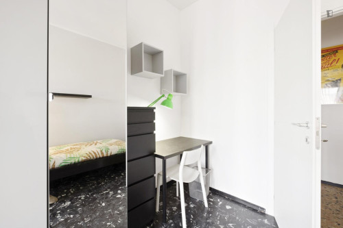 Bed in a comfortable twin bedroom, in the Municipio 6