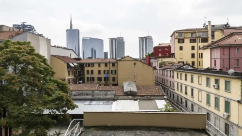 Room in a shared 4-bedroom apartment for rent in Isola.