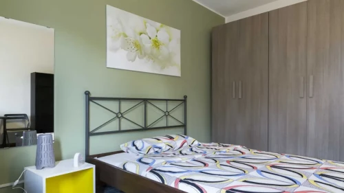 Room in a shared 4-bedroom apartment for rent in Isola. - Gallery - 13