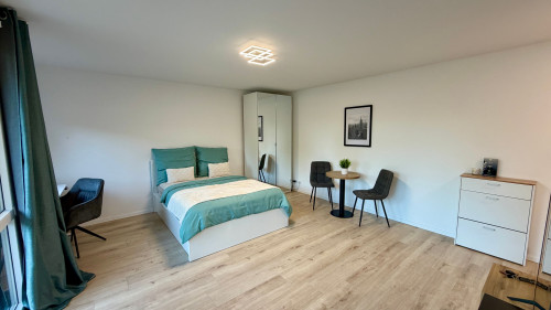 Modern studio with private terrace and view of a residents only garden