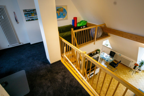 Furnished 2.5-room gallery apartment, top floor, balcony, underground parking, in Karlsfeld