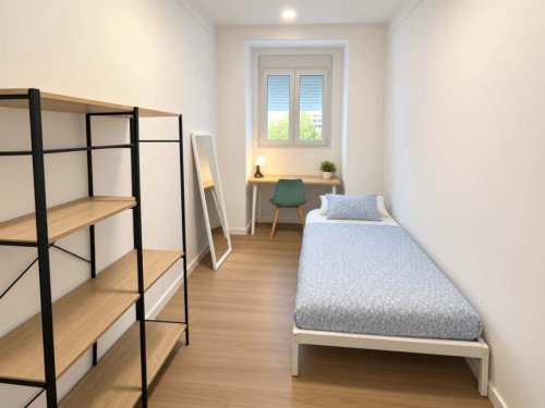 Bedroom in a 4-bedroom apartment in Rua Francisco Rodrigues Lobo, Lisbon - Room 1
