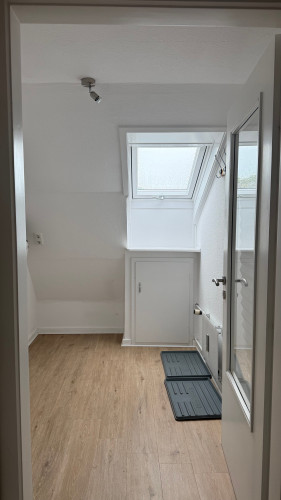 100 square metre Solgård holiday flat with a balcony overlooking the rooftops of Tönning, near St Peter Ording and the North Sea