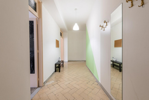 Large bedroom in a 4-bedroom apartment near Bari Sud Est train station