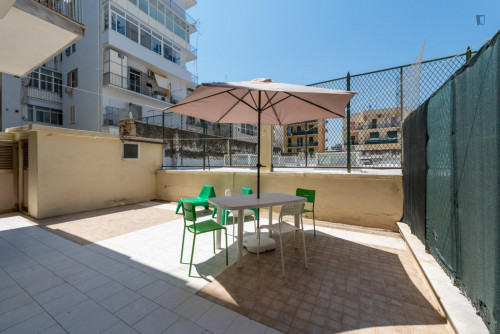 Large bedroom in a 4-bedroom apartment near Bari Sud Est train station
