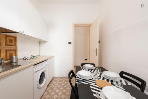 Large bedroom in a 4-bedroom apartment near Bari Sud Est train station