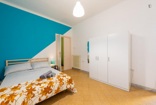 Large bedroom in a 4-bedroom apartment near Bari Sud Est train station