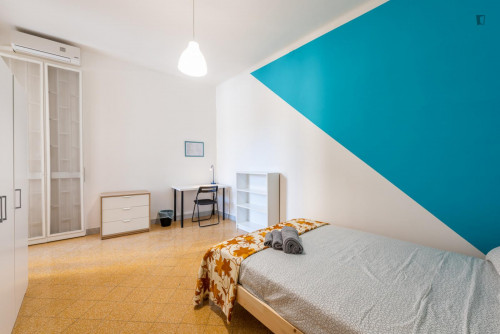 Large bedroom in a 4-bedroom apartment near Bari Sud Est train station