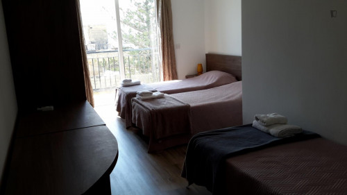 Nice single bed in a triple bedroom in a shared apartment in Sliema, near Sliema Ferries bus stop