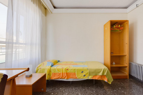 Bedroom in a great apartment next to the UM with awesome views of Plaza de Toros